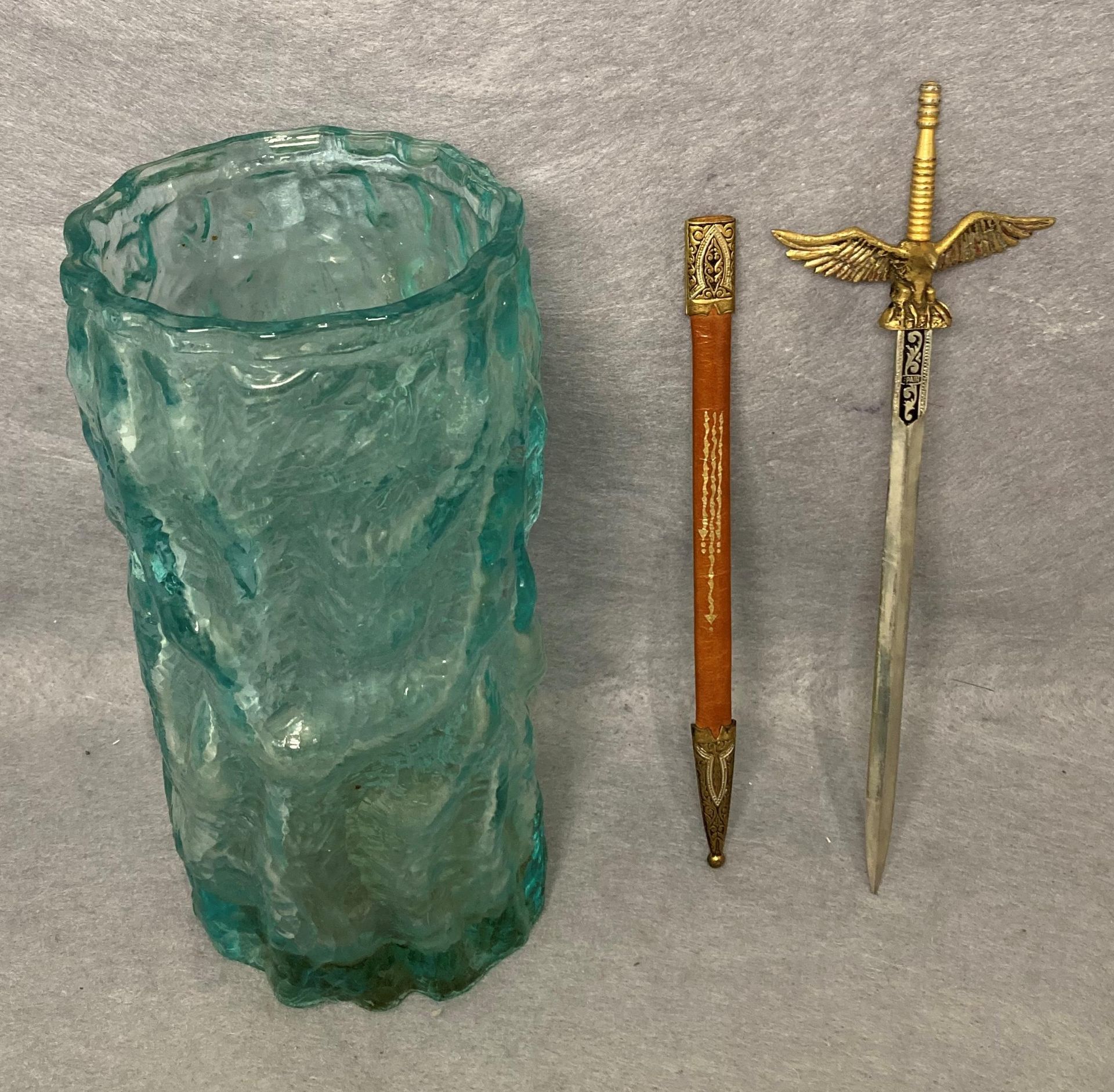 A Whitefriars light blue bark finish vase (20cm high) and a Toledo letter opener (saleroom