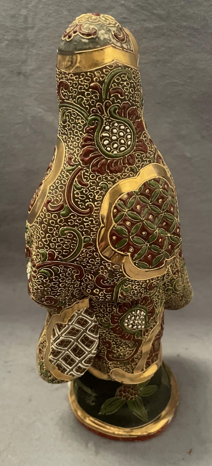 An Oriental Satsuma Kutani porcelain hand painted figurine, - Image 2 of 4