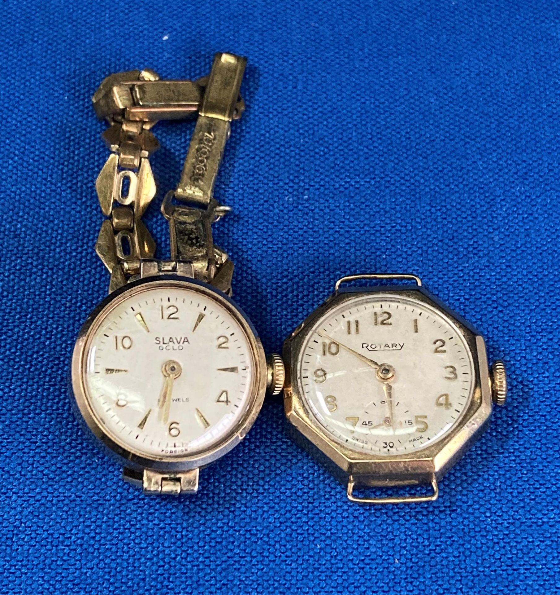 9ct gold (375) Slava gold case watch (strap - gold-plated) and a Rotary gold case watch (no strap).