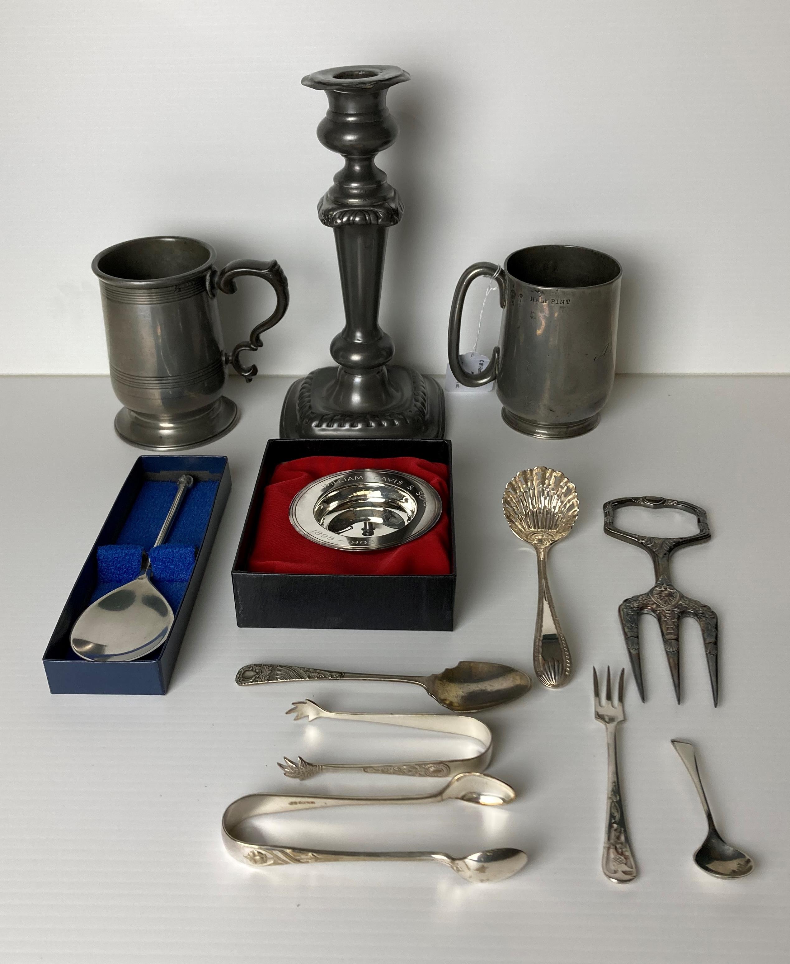 A pewter half-pint tankard with four Royal Sphere markings and etched with 4 N Dodds and stamp to