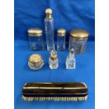 Contents to box - three silver top (hallmarked) dressing table set items and a set of three glass