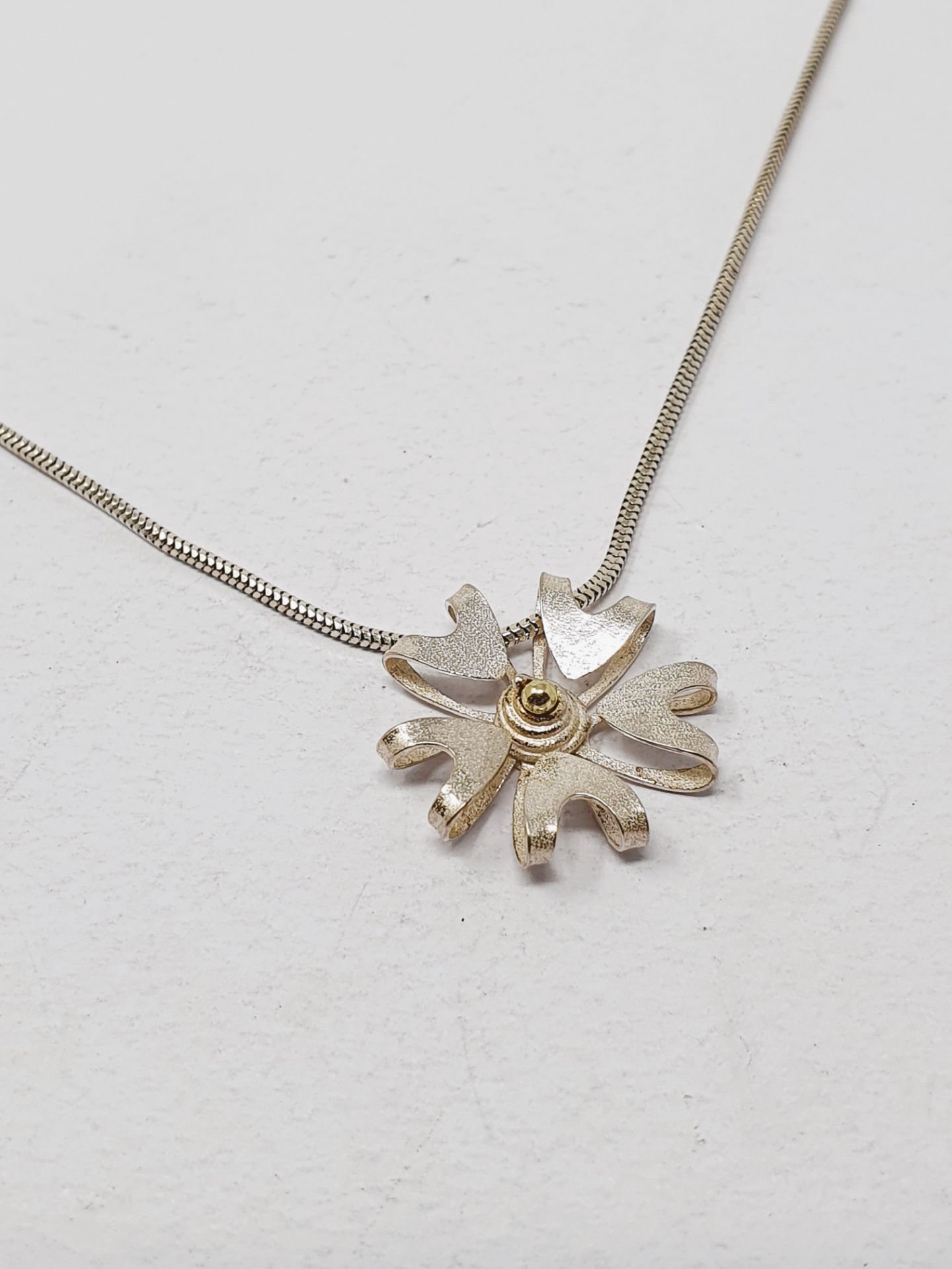 Sian Elizabeth Hughes, handmade sterling silver 'Foliage' necklace and two 'Bloom' pendants, - Image 3 of 5