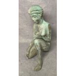 A metal nude lady figurine in seated position (possibly bronze - not tested),