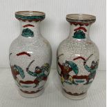 A pair of Chinese hand painted and crackle vases, 14.