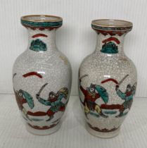 A pair of Chinese hand painted and crackle vases, 14.