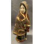 An Oriental Satsuma Kutani porcelain hand painted figurine,