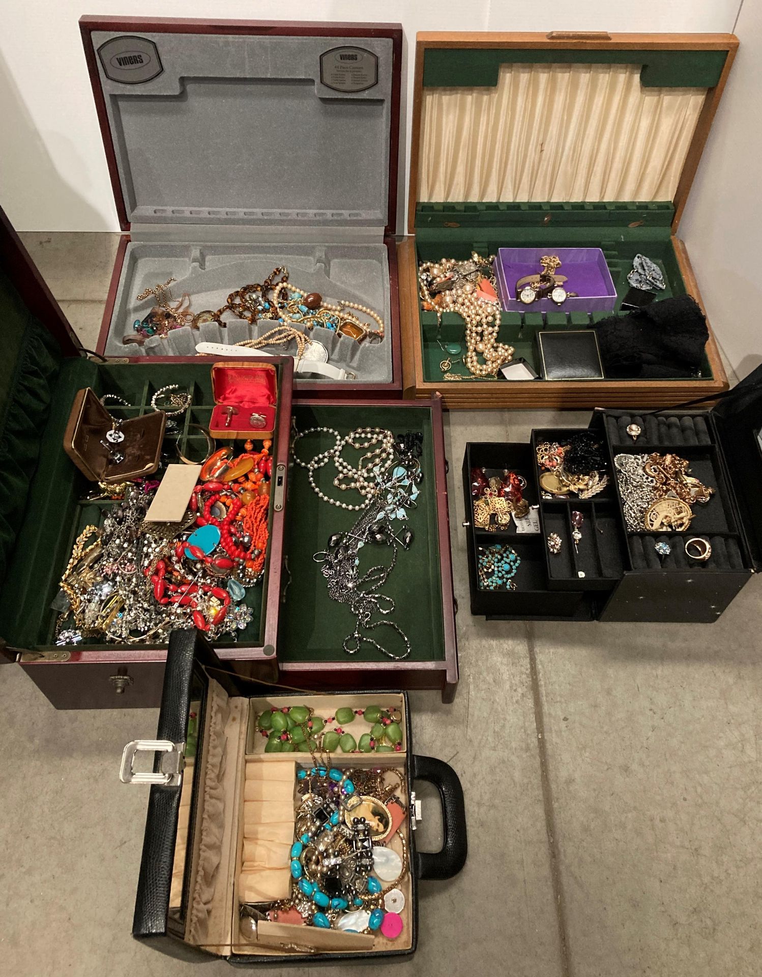 Three jewellery boxes and two canteen of cutlery cases all containing costume jewellery including