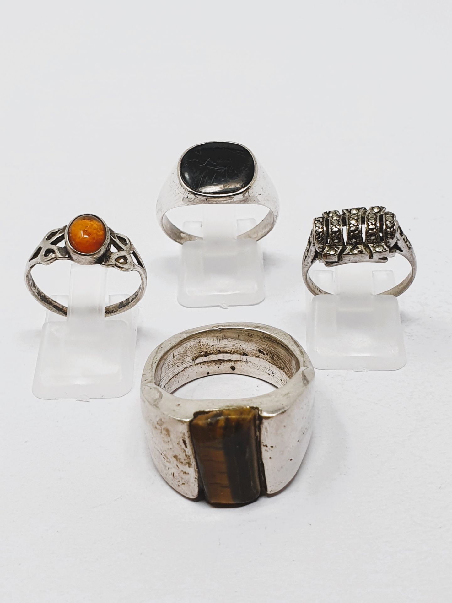 Four sterling silver rings, gross weight 44.
