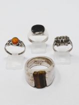 Four sterling silver rings, gross weight 44.