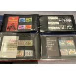 Contents to two stamp albums - approximately seventy assorted Mint stamp packs including Royal