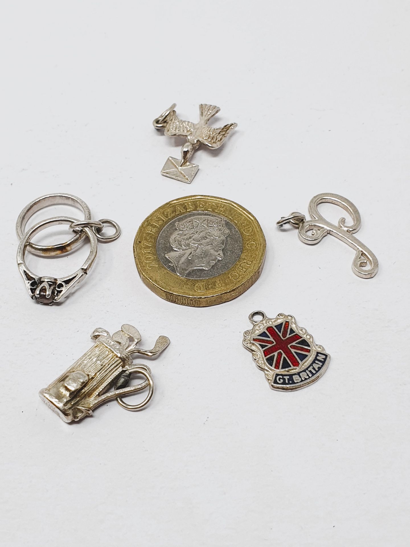 Sterling silver selection of fifteen vintage charms, including crown, football, bow and bells, - Image 3 of 3