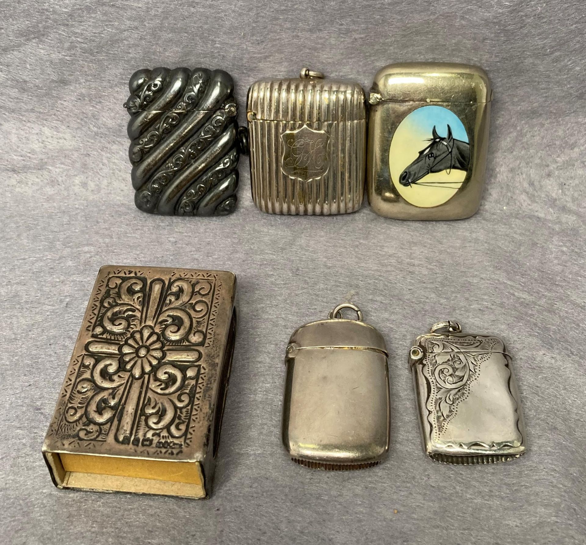 Five Vesta cases including three silver hallmarked (1891, 1895, 1907,