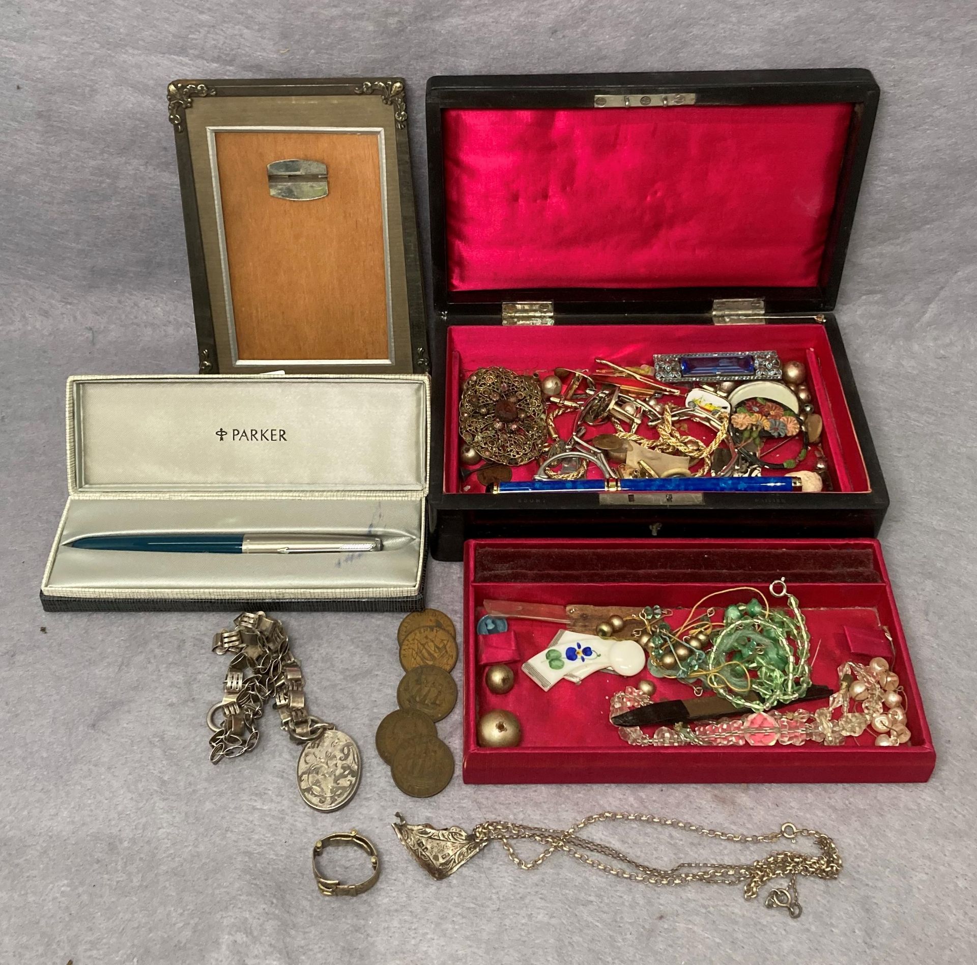 Five assorted silver hallmarked items including a vintage silver locket and chain, two other chains,