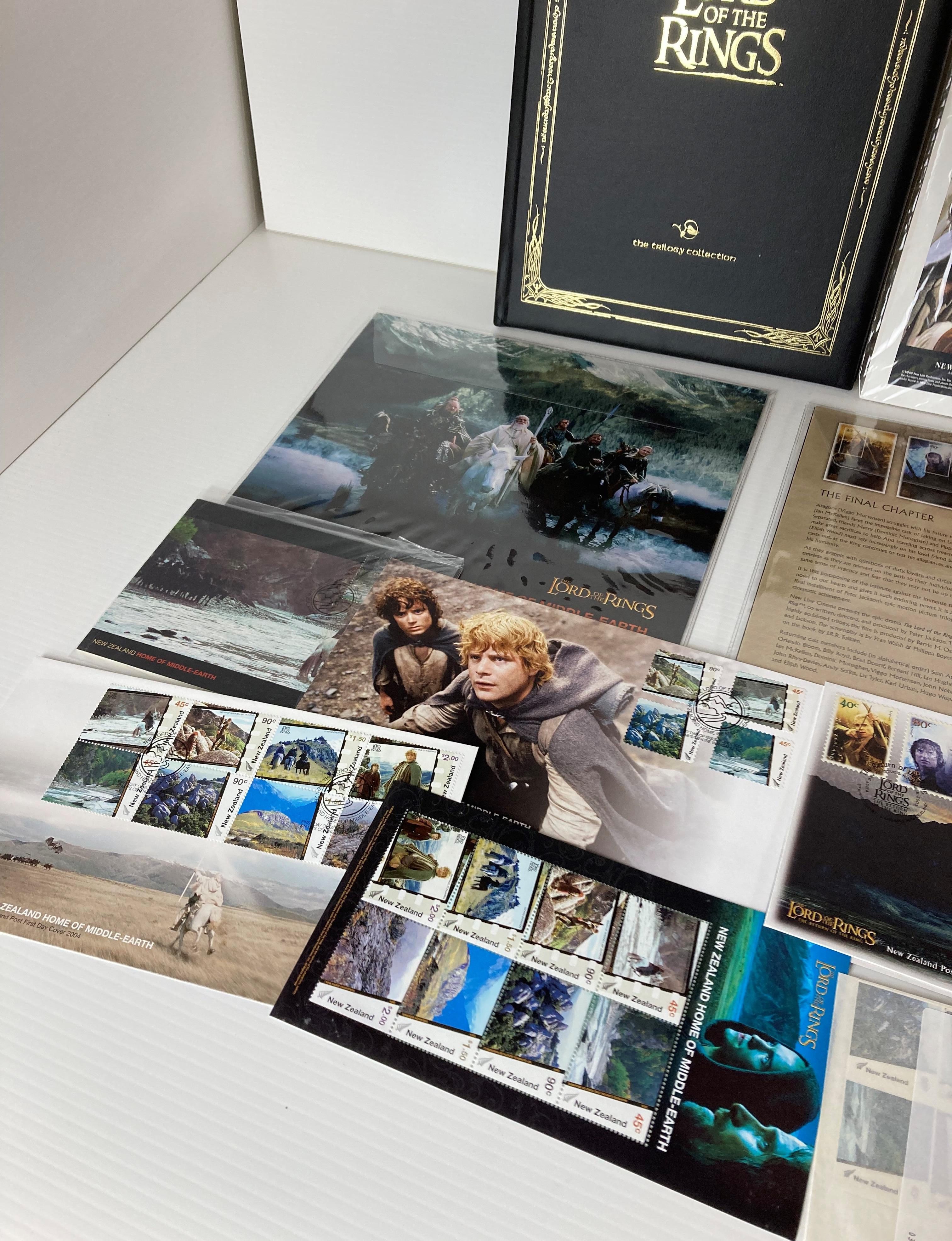 A collection of Lord of The Rings stamps including 'The Trilogy Collection' folder (full) and a - Image 2 of 8
