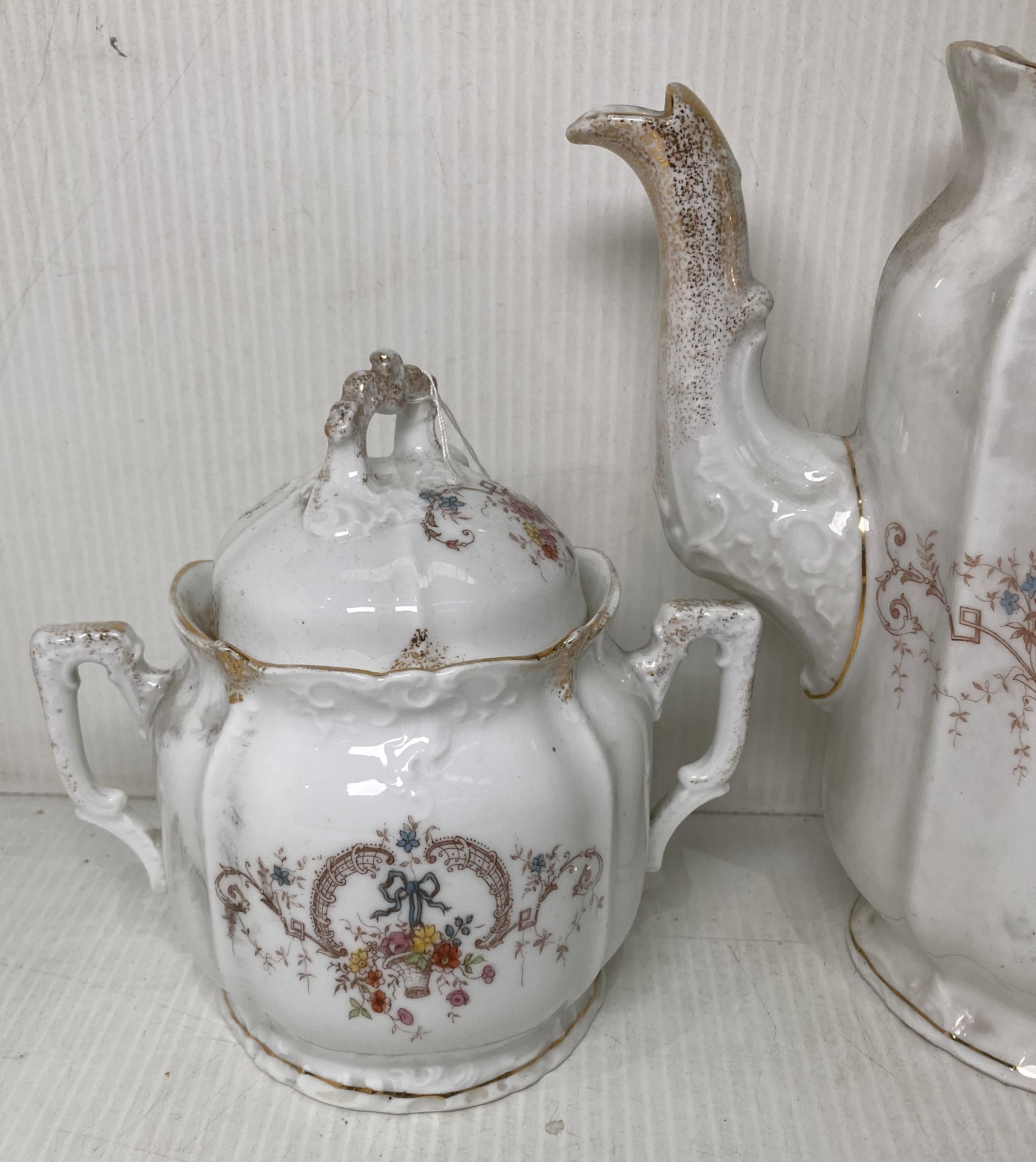 A late 19th Century Hermann Ohme three-piece tea service including sugar bowl (with lid), milk jug, - Image 2 of 5