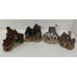 Three assorted David Winter house figurines including Stratford House, Tudor House,