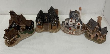 Three assorted David Winter house figurines including Stratford House, Tudor House,