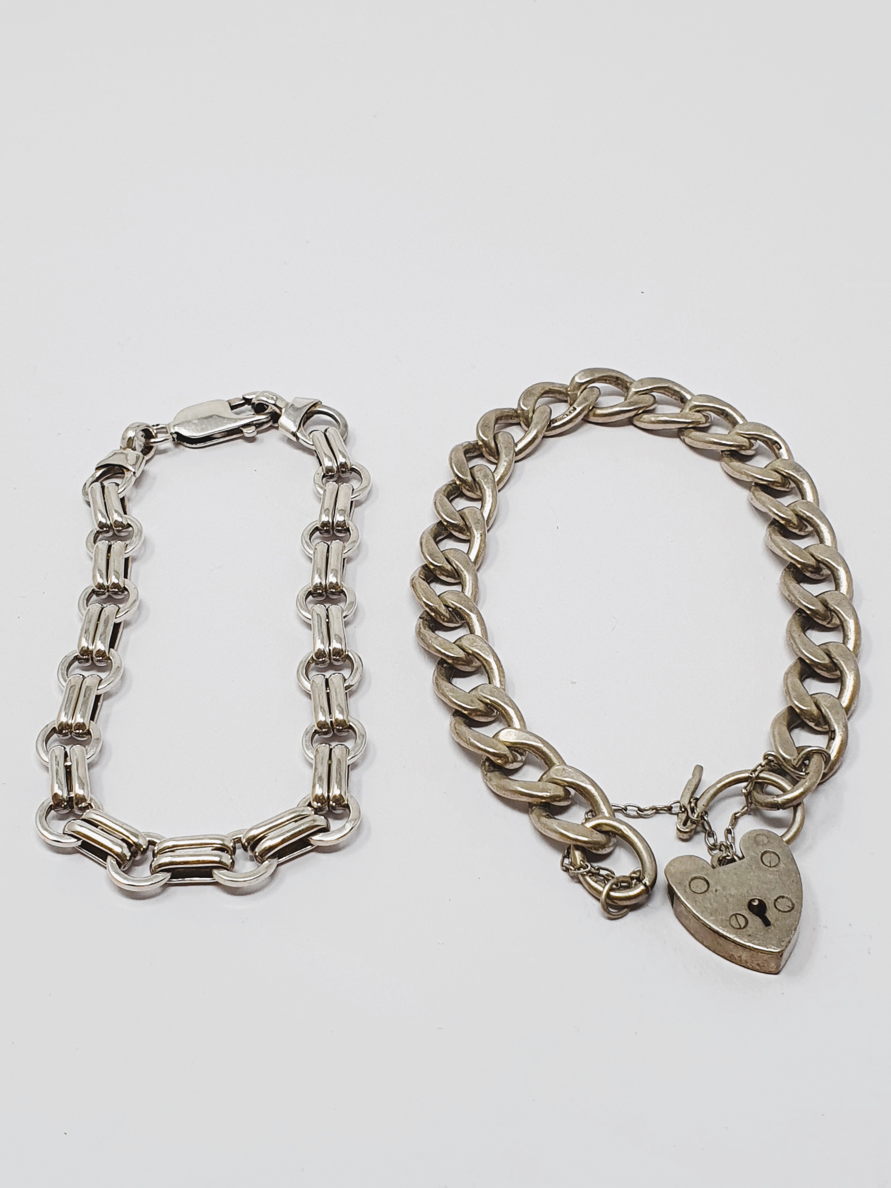 Sterling silver filed curb bracelet, padlock fastener with safety chain, gross weight 27. - Image 2 of 2