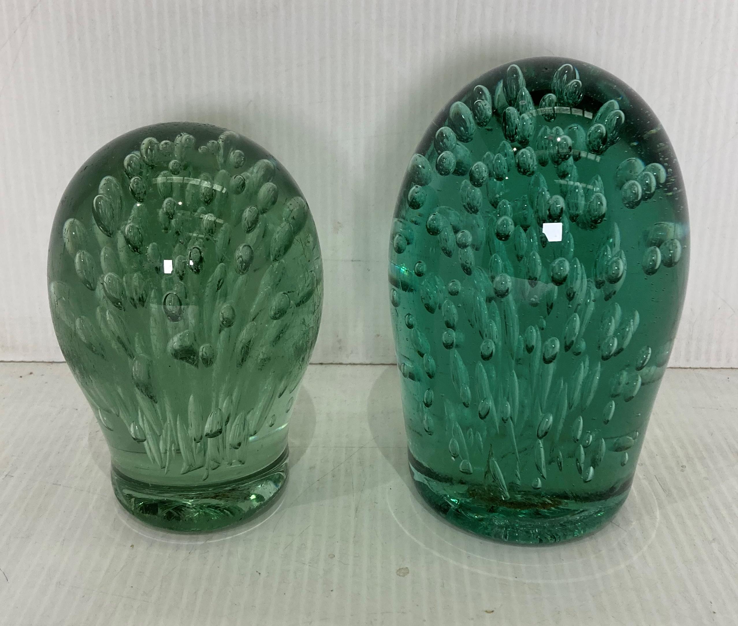 Two vintage glass dump paper weights,