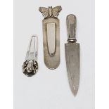 Sterling silver, three bookmarks, a thimble and two condiment spoons, gross weight 27.