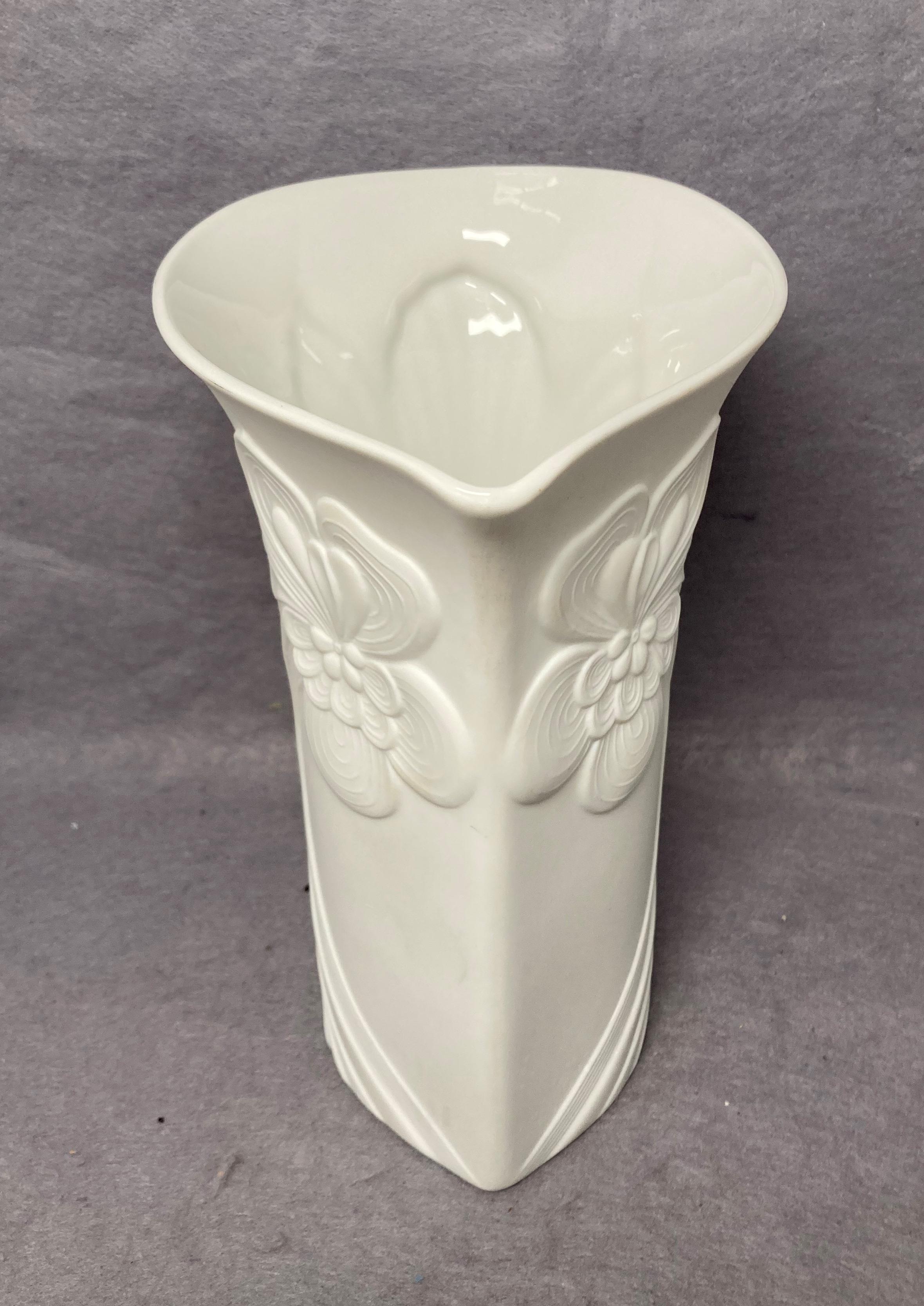 A Kaiser matte white vase decorated in flower designs no: 0333 with artist signature to base, - Image 2 of 3