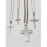 Sterling silver, three pendants with chains and four crosses with chains, gross weight 42.