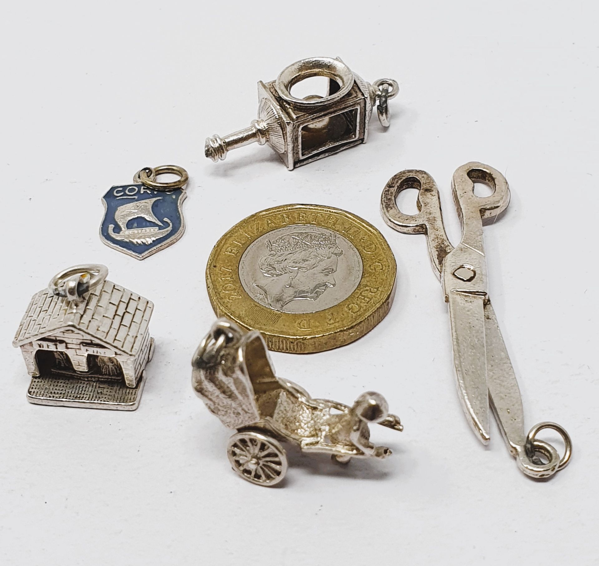 Sterling silver selection of thirteen vintage charms, including driving licence, comb and brush set, - Image 2 of 3