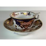 A vintage Royal Crown Derby teacup and side plate/shallow dish with Imari pattern (saleroom
