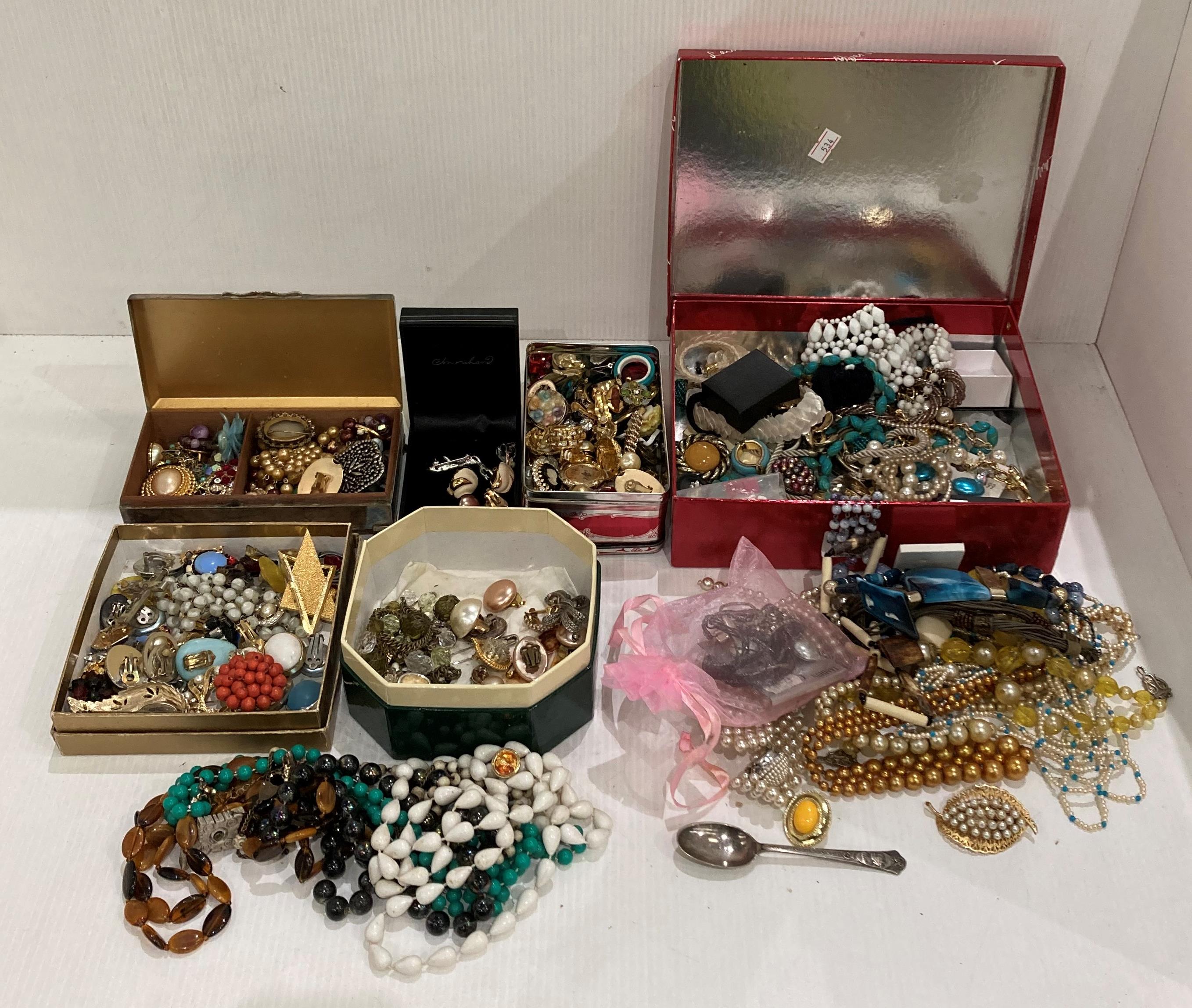Large quantity of costume jewellery in tins and boxes including an Aristocrat EPNS cigarette box,