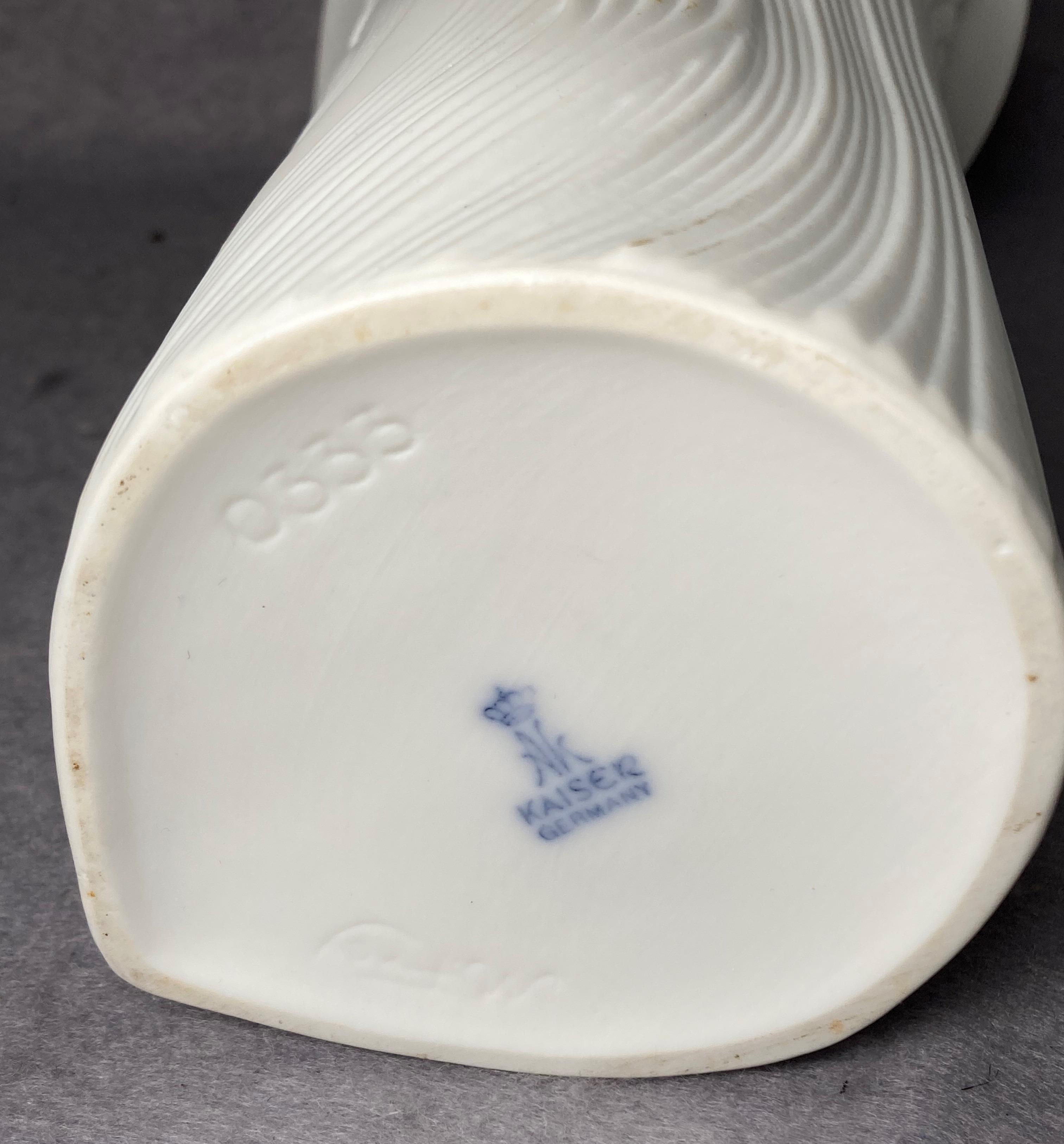 A Kaiser matte white vase decorated in flower designs no: 0333 with artist signature to base, - Image 3 of 3