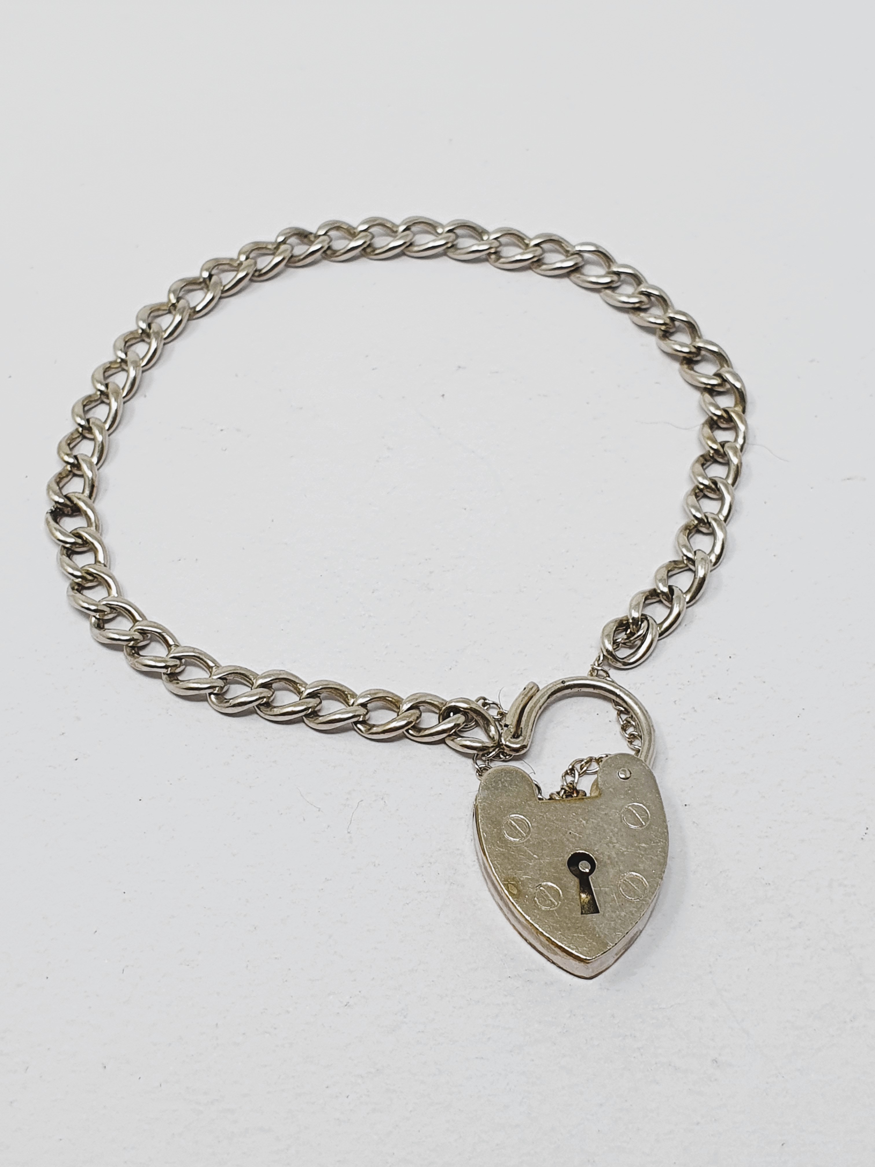 Sterling silver vintage charm bracelet, graduated curb links, padlock fastener and safety chain, - Image 2 of 3