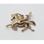 9ct gold vintage galloping horse with rider charm, gross weight 2.