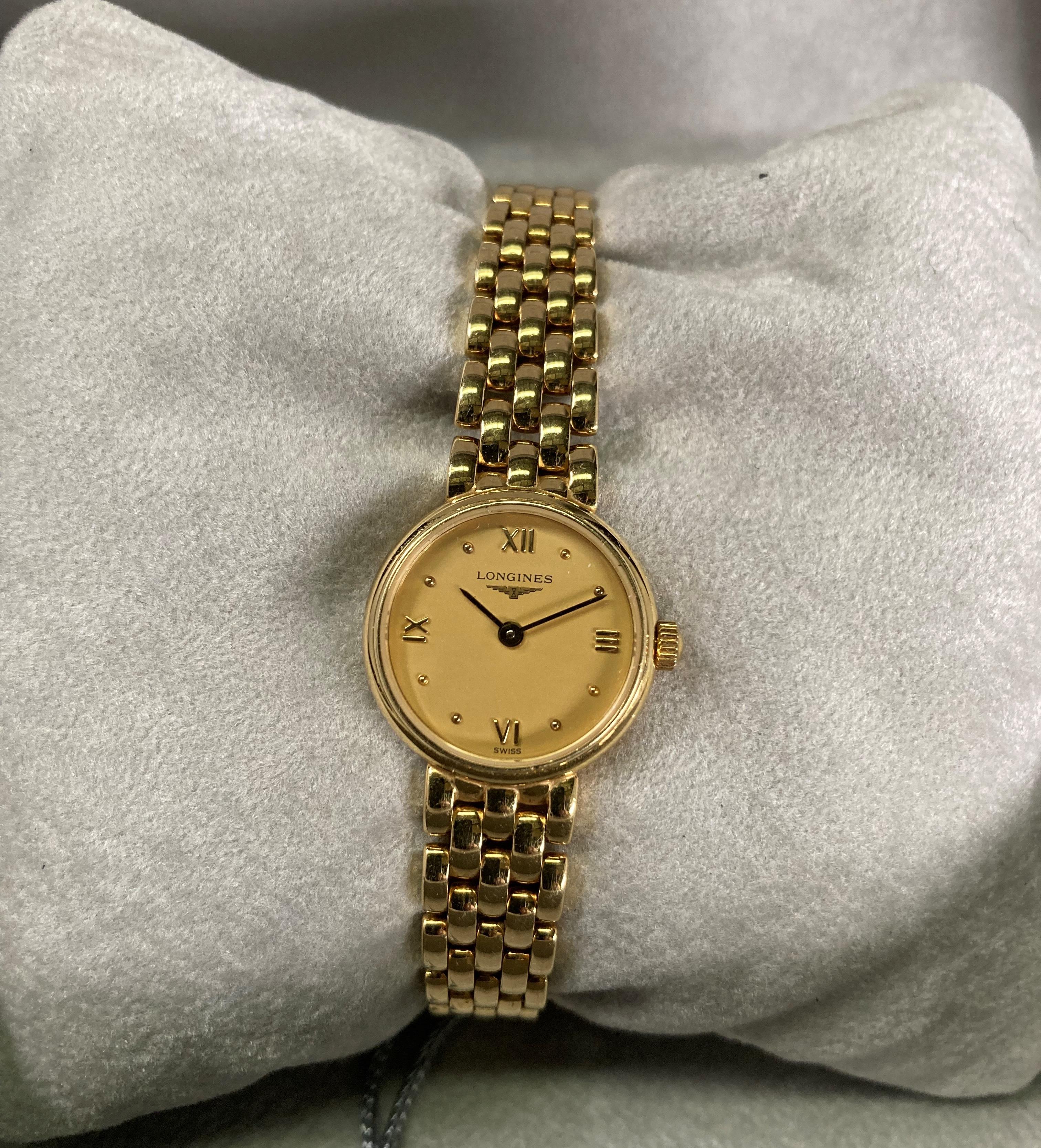 Longines 18k (750 hallmark on back and clasp) ladies gold watch model: L6 1076, complete with case,