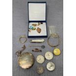 Contents to bag - assorted gold and silver items including a shield shaped tag/pendant,