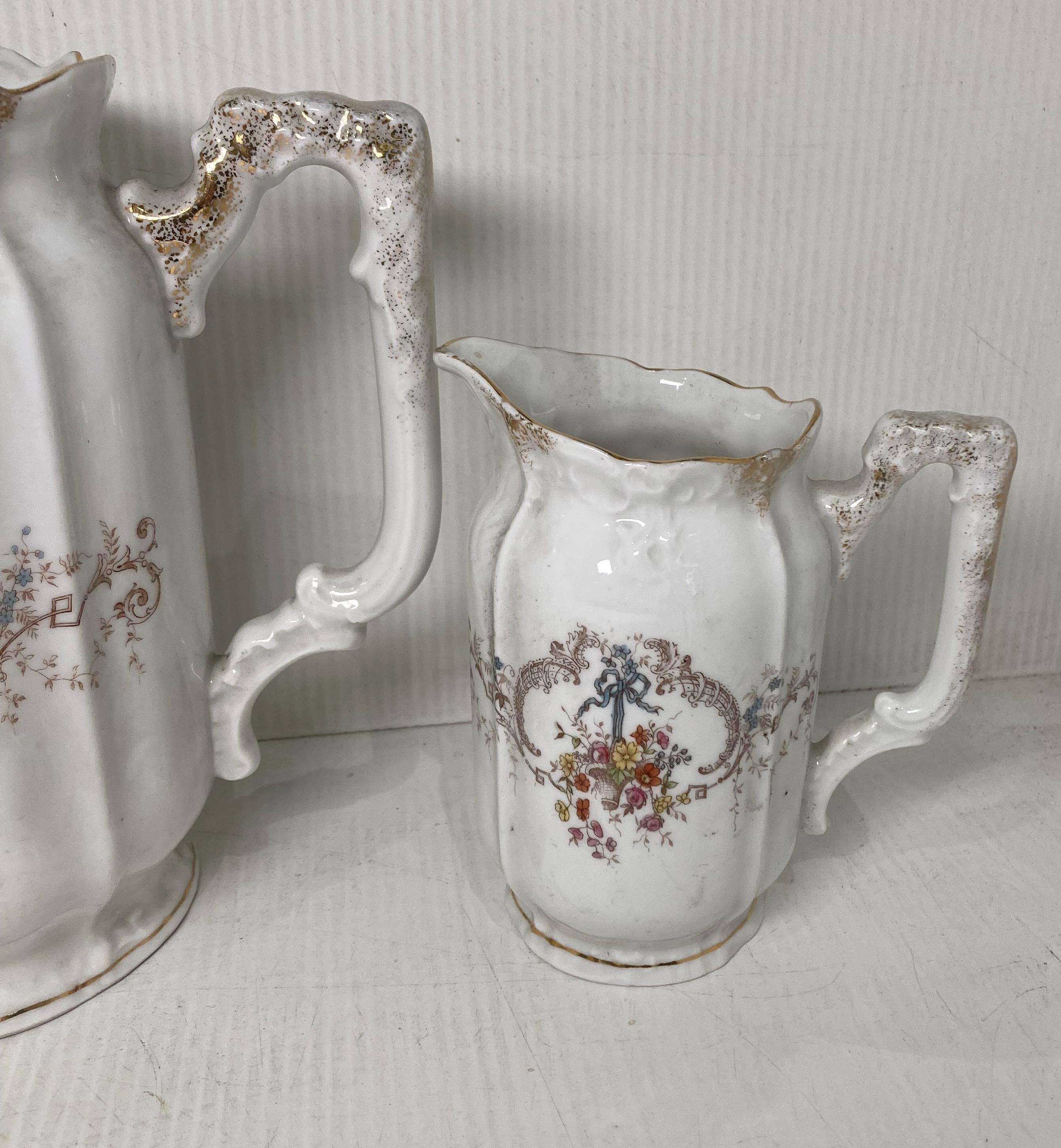 A late 19th Century Hermann Ohme three-piece tea service including sugar bowl (with lid), milk jug, - Image 4 of 5
