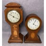 Two mahogany cased mantel clocks - one Swiss Made (23cm high) and one French Made (31cm high) -