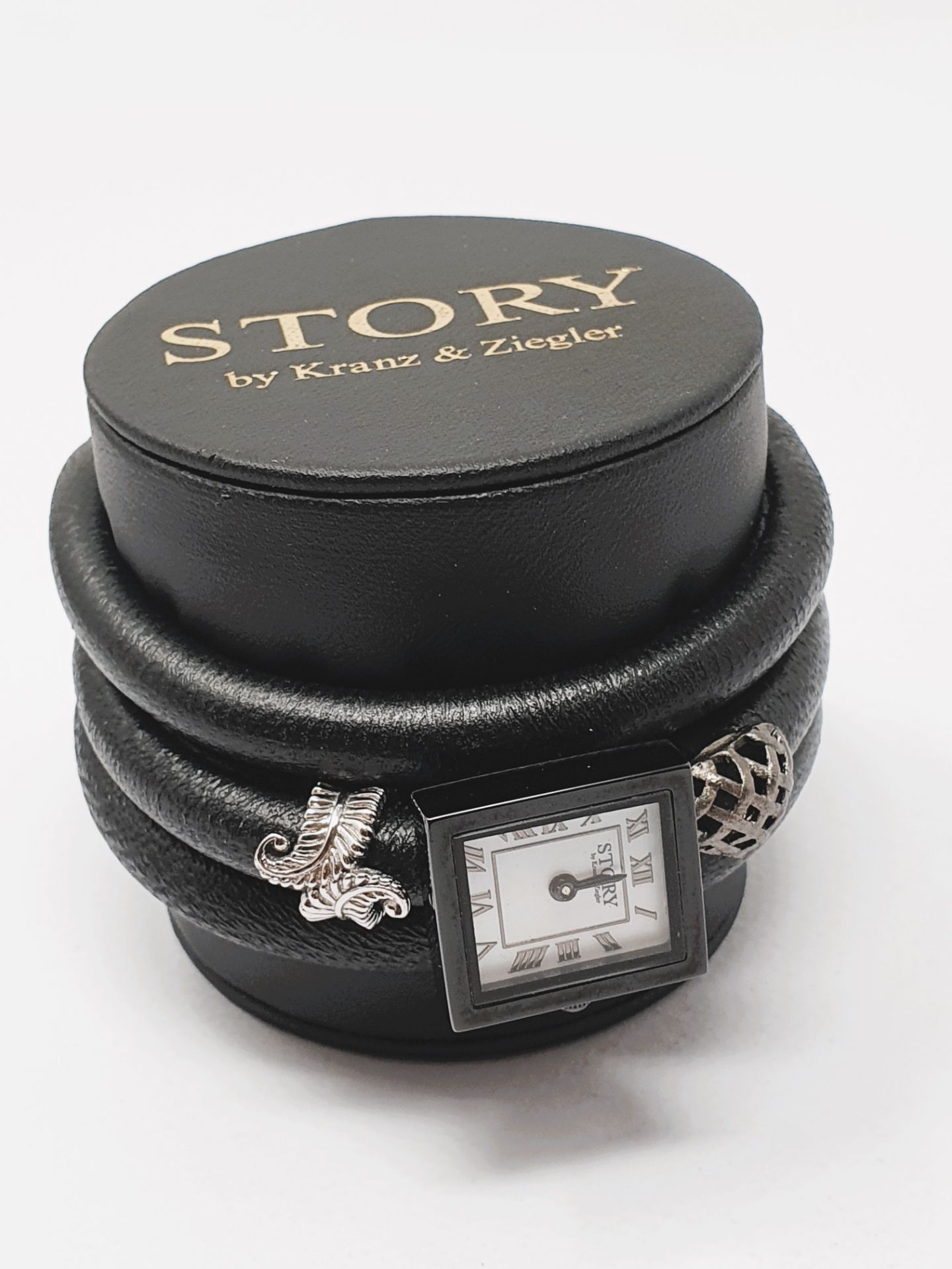 STORY' by Kranz & Ziegler black leather wrap bracelet with two sterling silver charms and watch,