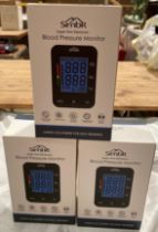 Two boxed Simbr upper arm electronic blood pressure monitors (saleroom location: S2 tables QB13)