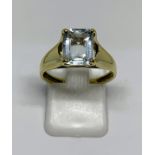 9ct gold blue topaz solitaire ring, finger size O, gross weight 2.