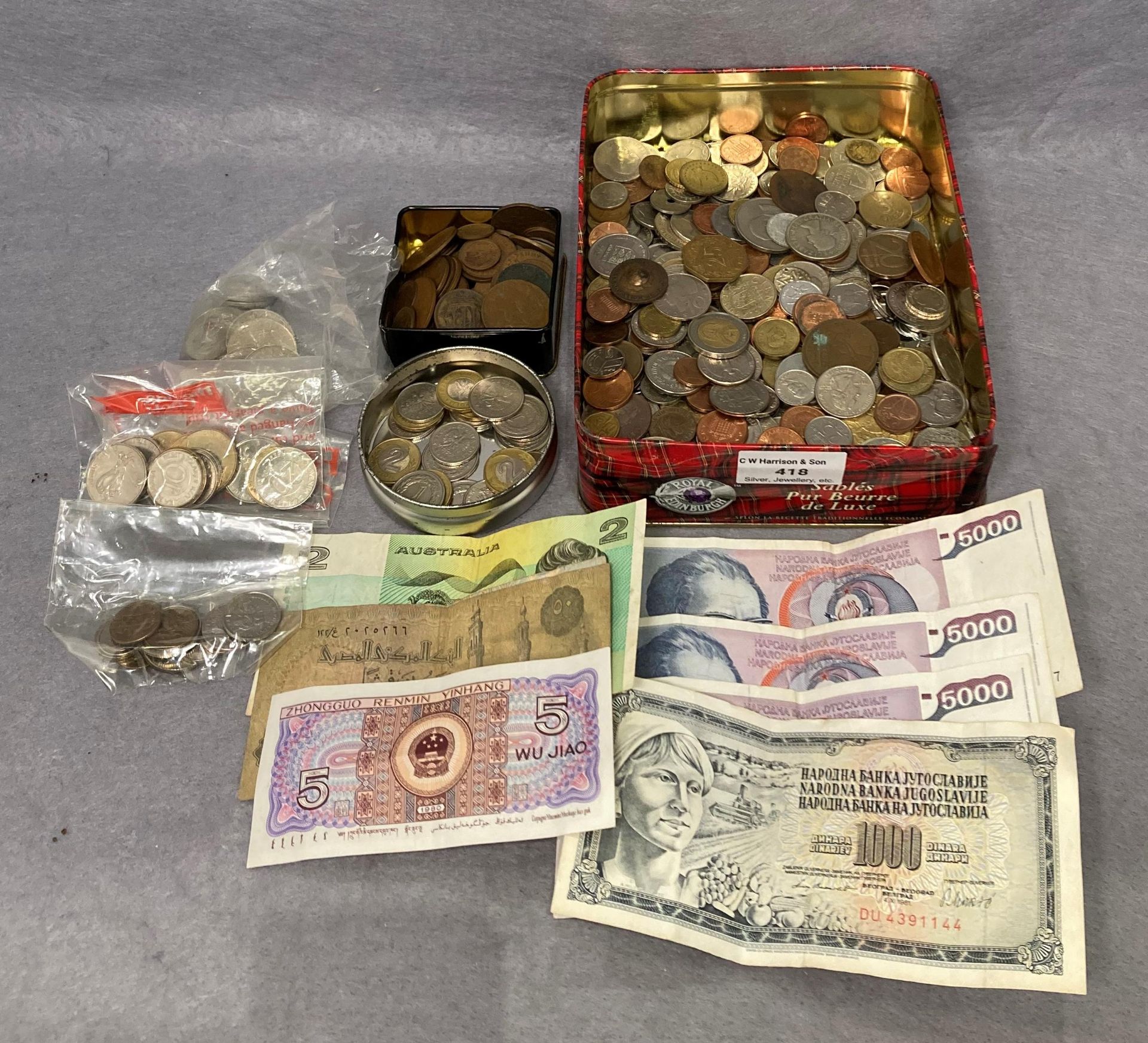 Contents to tin - large quantity of assorted coins and eight assorted bank notes (saleroom