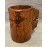 A Victorian wooden dry or wet measuring cup/mug with Crown & VR and one other stamp to outside,
