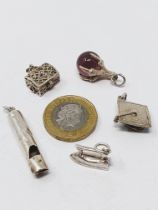 Sterling silver selection of nineteen vintage charms, including tankard, fish, claw,