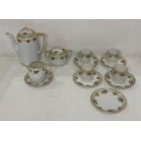 A vintage thirteen piece Noritake tea service including coffee pot, sugar bowl, cream jug,