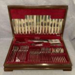 A walnut case canteen of cutlery fitted with 63 piece of EPNS Gainsborough cutlery Greenwoods of
