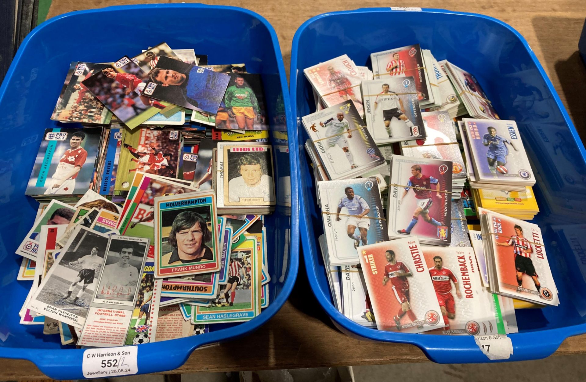 Contents to two blue plastic trays - a large quantity of football trading cards including Topps