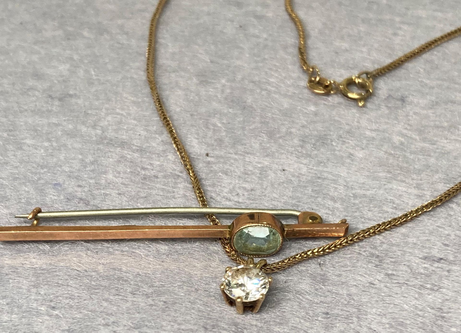 Two 9ct gold (375) items including a rope chain (16" long) with a 9ct gold single stone pendants - Image 2 of 3