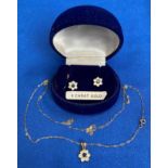 9ct gold (375) sapphire flower design pendant with a 9ct gold thin chain (20") and a matching pair