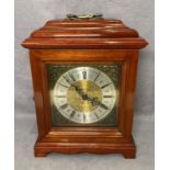 Mahogany cased West German mantel clock with brass face,