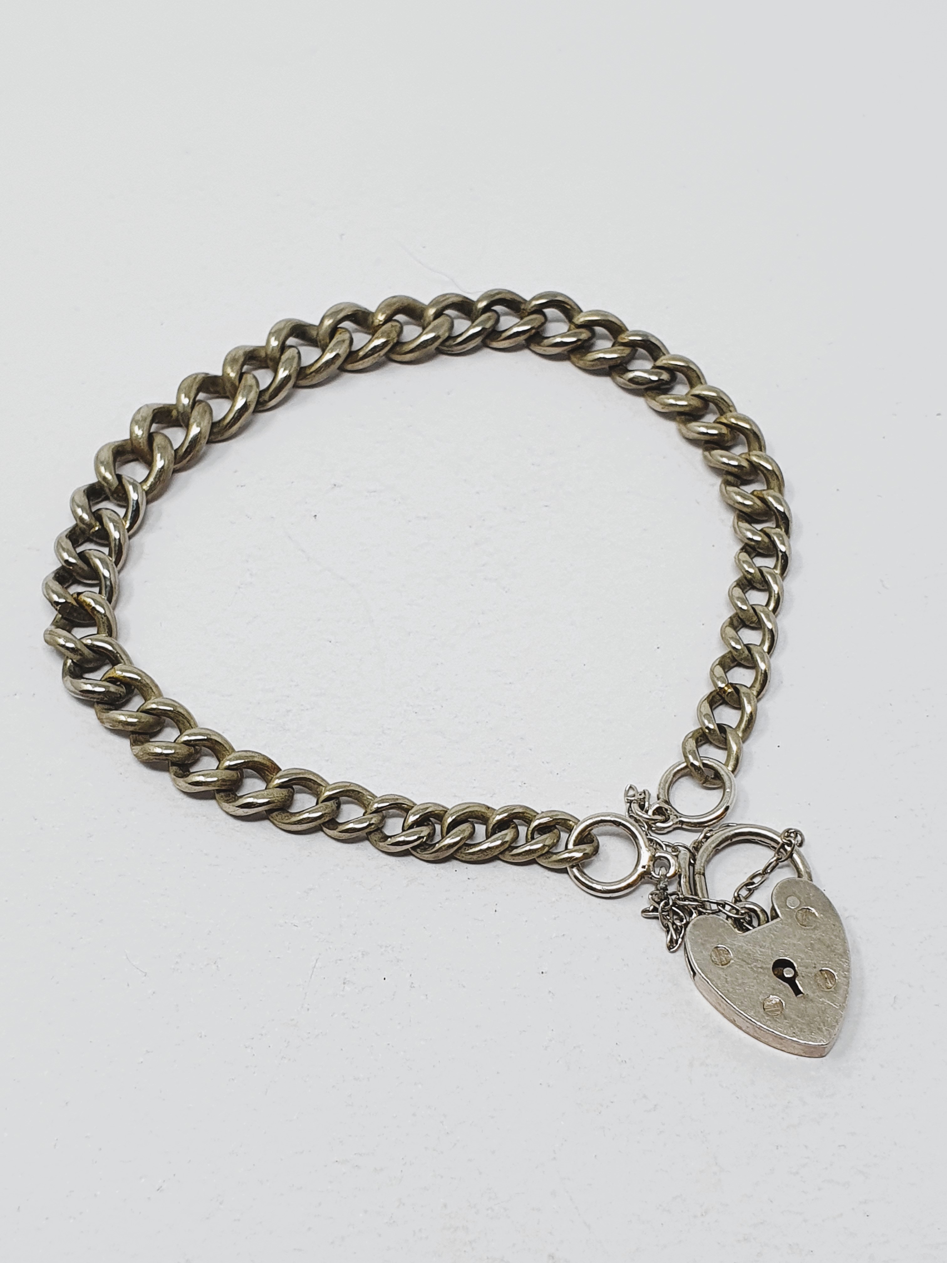 Sterling silver vintage charm bracelet, graduated curb links, padlock fastener and safety chain, - Image 3 of 3