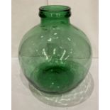 A green glass terrarium,